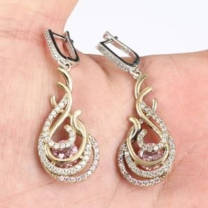 Pink & white Topaz stones set in flames earrings